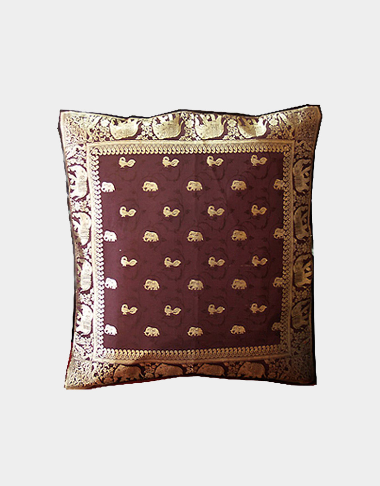 Chique and ravishing to see, these cushion covers are true articles of textile art and design. Golden Jari work of elephants and peacocks adorn the silk of the covers.