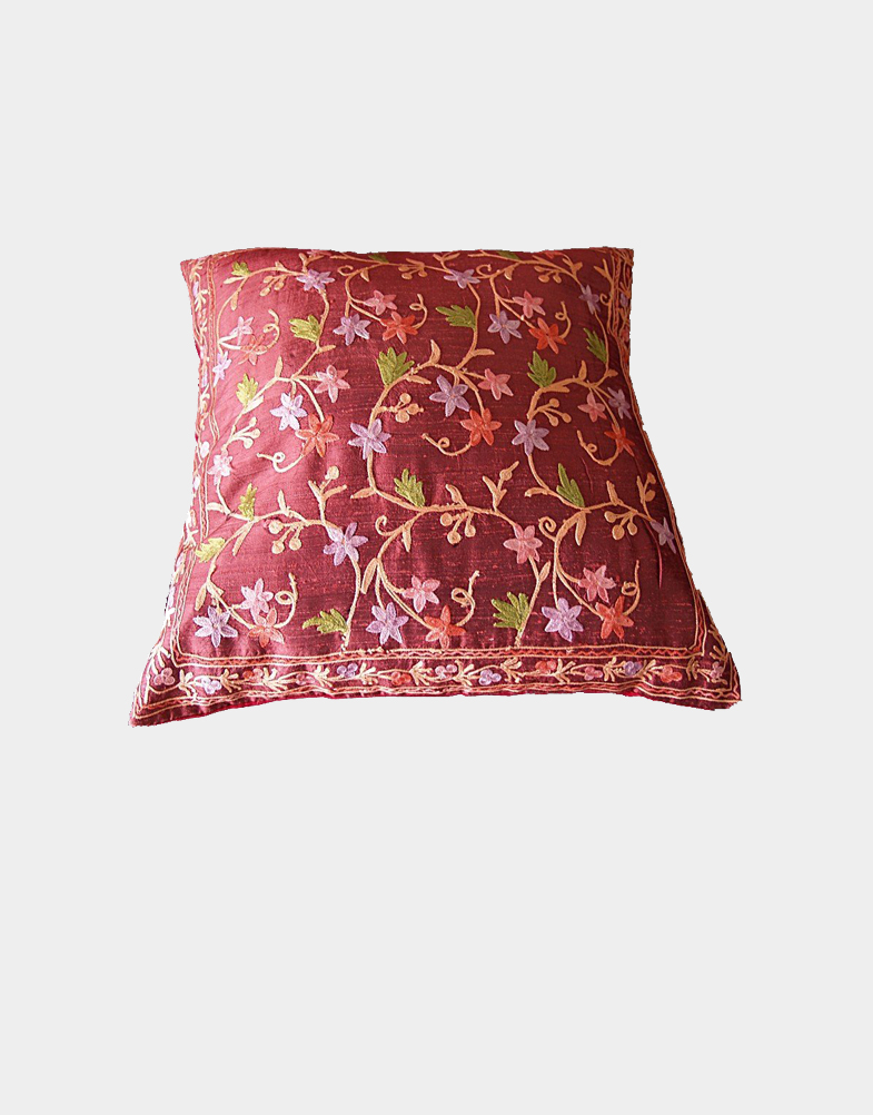 These cushion covers of amazing shades are from India and is radiant with Aari Embroidery on pure silk. Beautiful floral embroidery all over the cover. Own it!