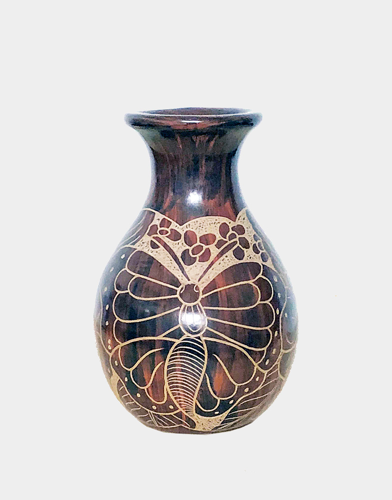 This decorative pot from Nicaragua is 5 inches tall and 4 inches in diameter, featuring a butterfly design. Shop this Fair Trade products from Nicaragua.