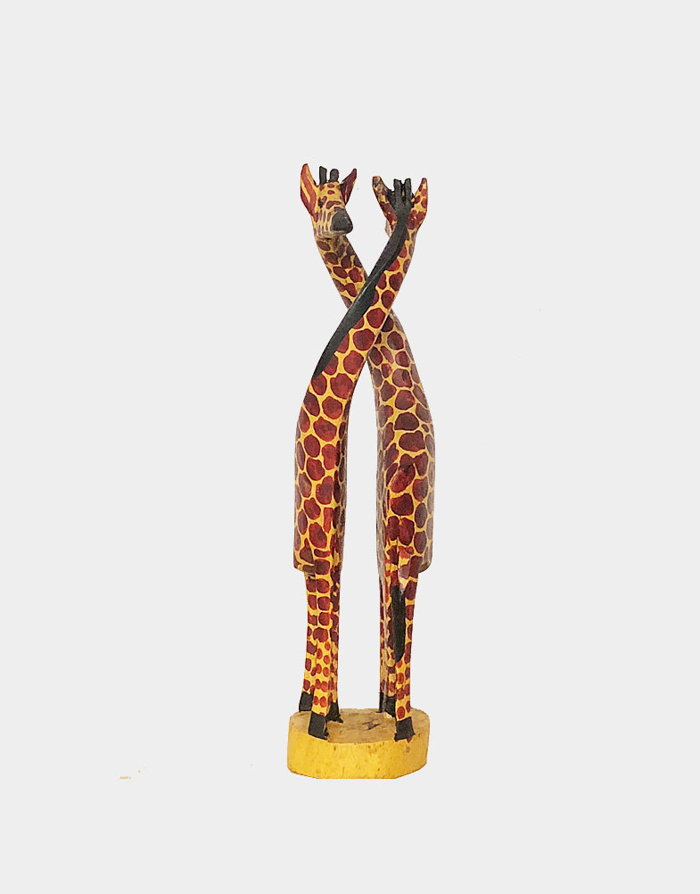 Discover a new feeling with this 12" hand-curved wooden giraffe couple. This is hand-carved wood art is made of Jacaranda tree and made in Kenya. Free shipping.