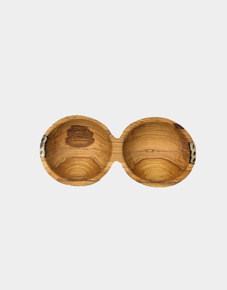 Double condiment handmade bowl made in Kenya from wild olive wood - this beautiful duet serving bowl makes a stylish addition to your tabletop. Buy it now.