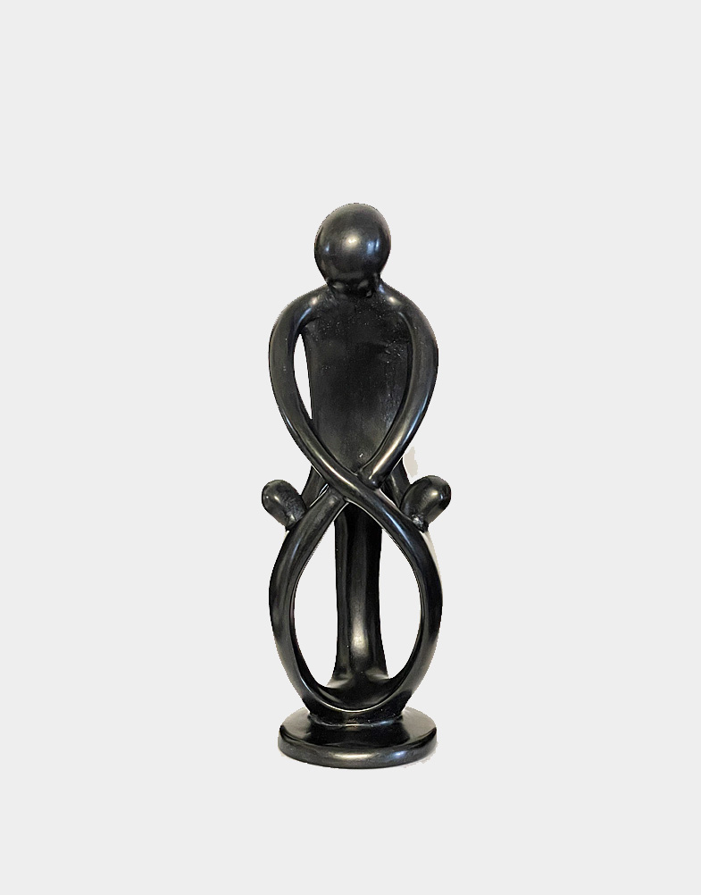 Hand-carved from Kisii soapstone by African artisans, the outstretched arms of one parent and children hold onto one another in love and connectivity. Craft Montaz