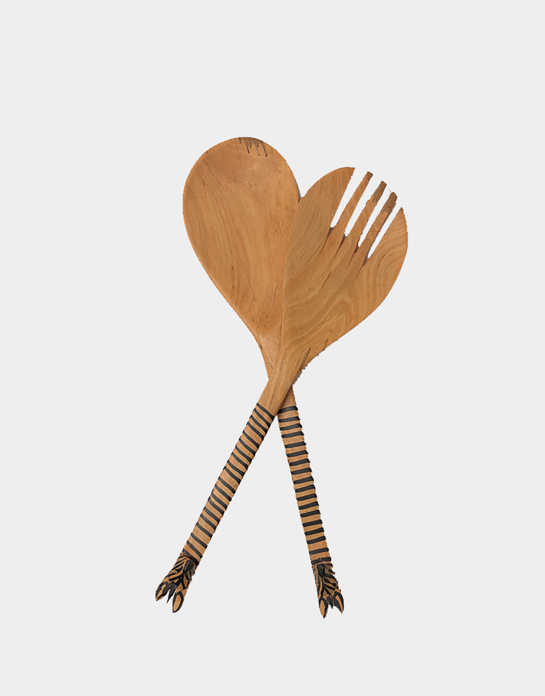 This mahogany wooden salad spoon set is hand carved and features cute little zebras on the end of each server. Sold as a set of two. Free shipping at Craft Montaz.