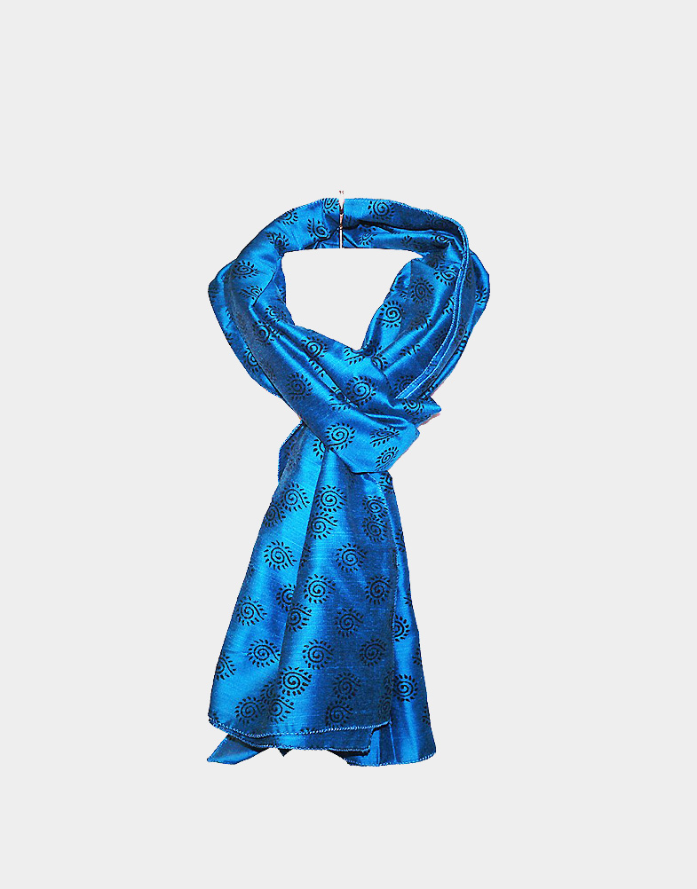 Add this bright turquoise blue Khadi silk scarf to your favorite outfit. The scarf has pure Indian motifs all over. Lightweight, easy to carry. Free shipping!