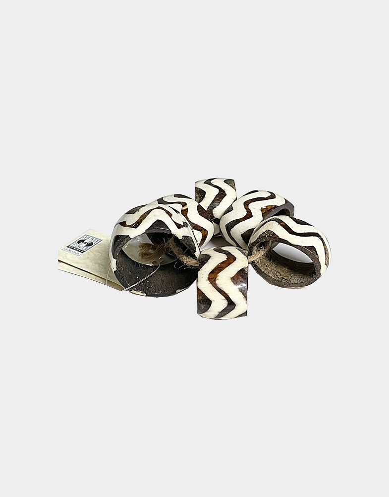 Kenyan artisans bleach and dye domestic cow bone to create these high-contrast napkin rings. Sold as a set of 6. Shop at Craft Montaz with free shipping.