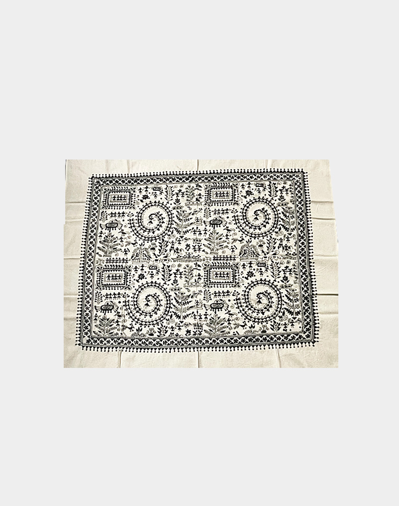 This cotton tapestry has traditional tribal Santal dancing circle embroidered with black thread work all over its body. Unique artwork perfect for your living room.