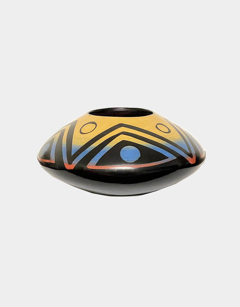These two pottery artworks are fully handcrafted in black base and yellow, red color. This special pottery is famously known as Chulucanas Pottery. Free shipping.