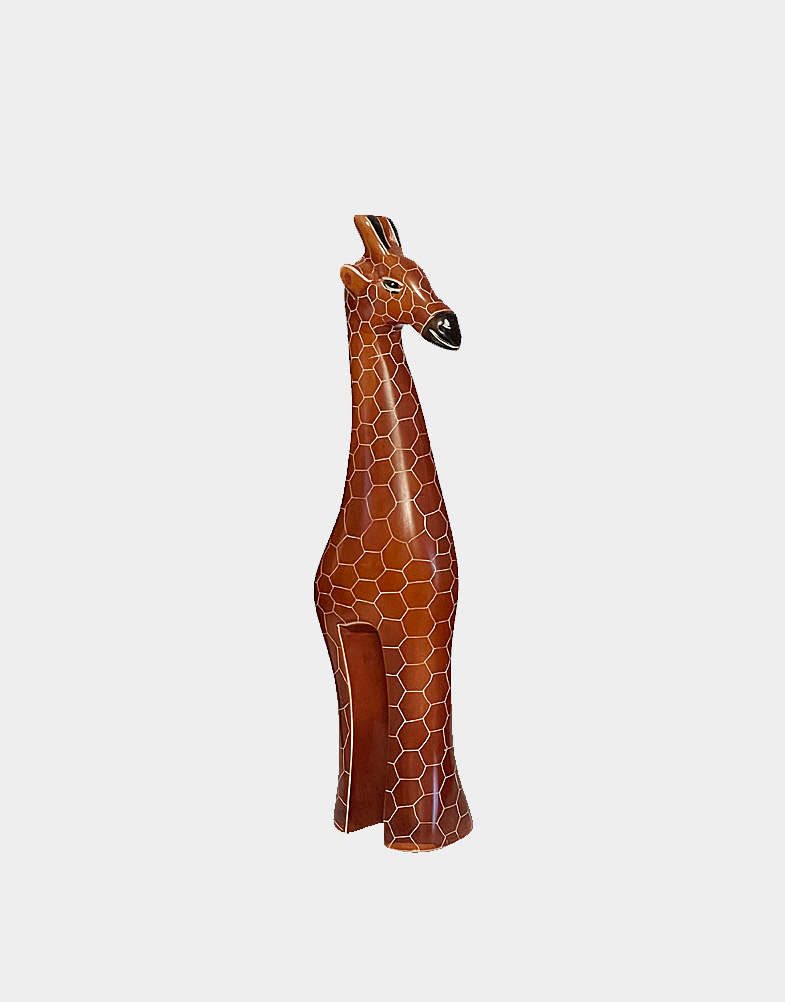Kenyan artisans hand carve these uniquely styled giraffe sculptures from soft soapstone, then add a rich hand dyed brown finish and etched details. Craft Montaz