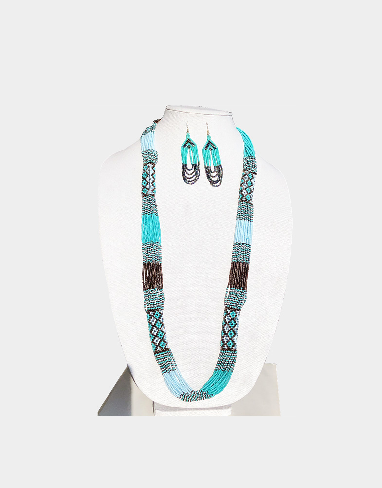 This unique necklace set is made by Kuki tribe women of Nagaland, India with aqua green, black, and light blue seed beads, woven in intricate geometric designs.