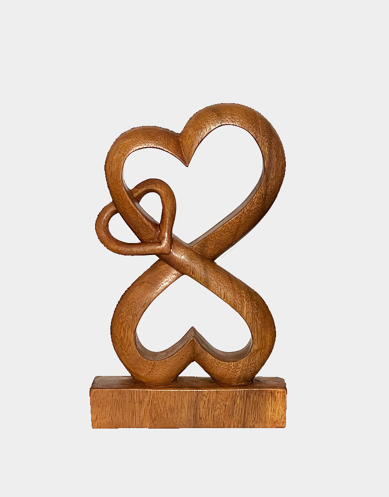 This Bali wood carving is made from Suar wood featuring fluid lines that convey the essence of natural harmony. Made in Indonesia. Shop with ree shipping.