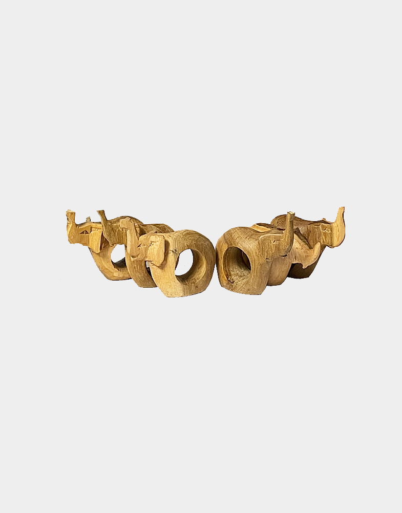 This set of six napkin rings of African safari elephant is carved from African Mahogany, using simple tools and traditional techniques Kenyan artisans. Buy now