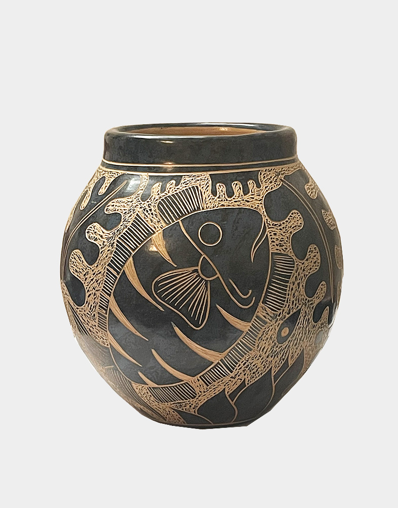 This decorative pot from Nicaragua is 5 inches tall and 5 inches in diameter, featuring a marbled blue fish relief design. Use for decorative purpose only. Buy now!