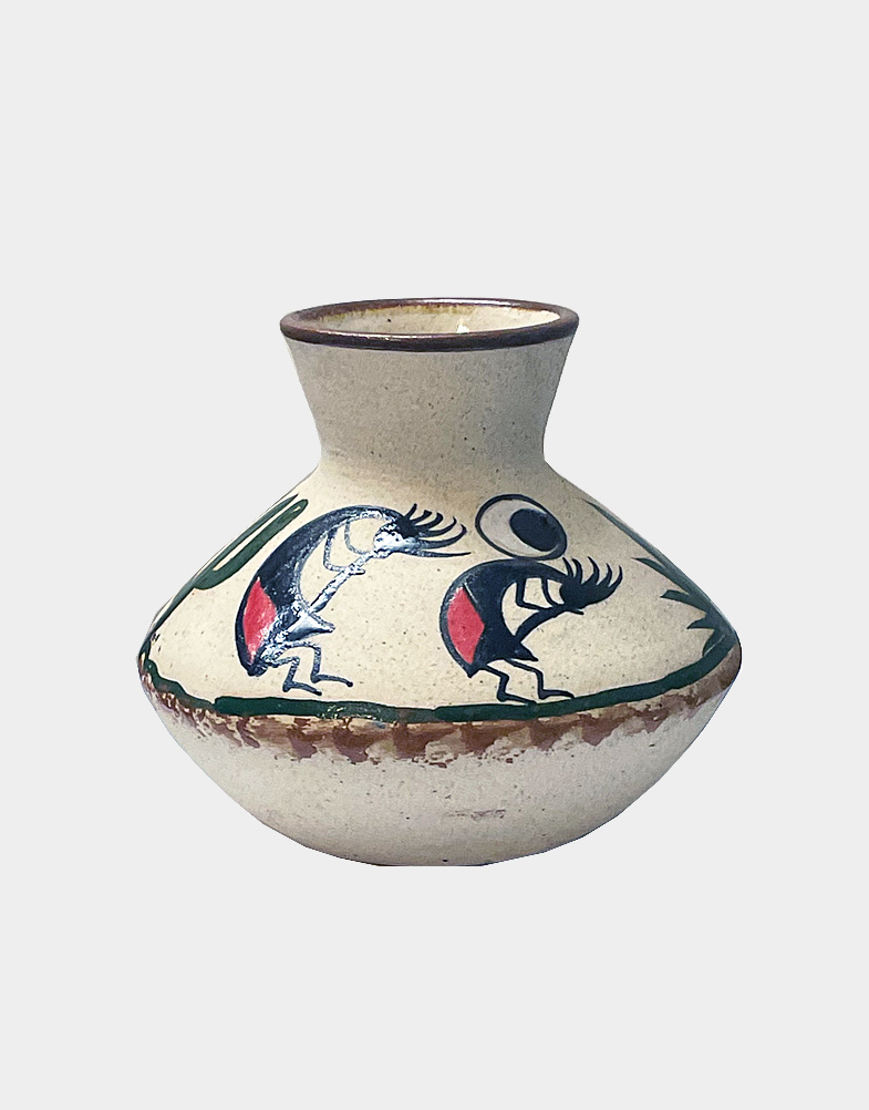This beautiful Mexican pot is unique for its cute shape. Made of sandstone, this pottery is entirely handmade by the local Mexican artists. Own this unique pot.