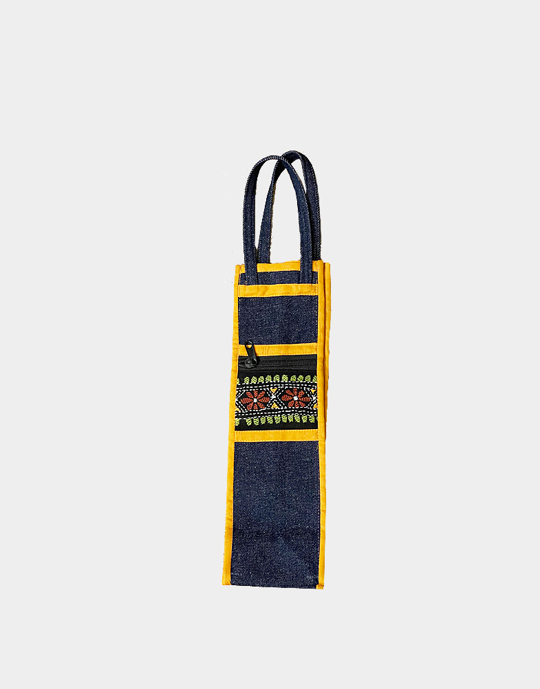 These bags are made of dark blue jeans fabric with contrast border of range piping with a outside pocket with zip. These also have small kantha stitched embroidery.