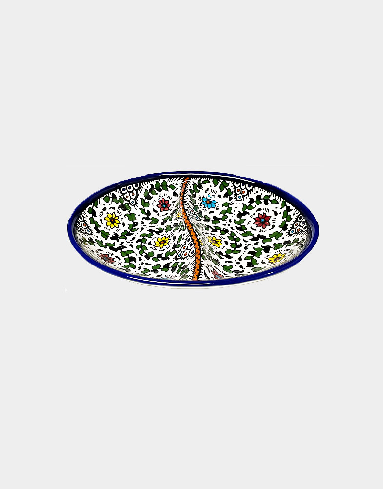 Colorful tabletop ceramics are intricately hand painted in bold floral designs, a traditional Palestinian craft. Microwave safe. Hand wash. Buy it now!